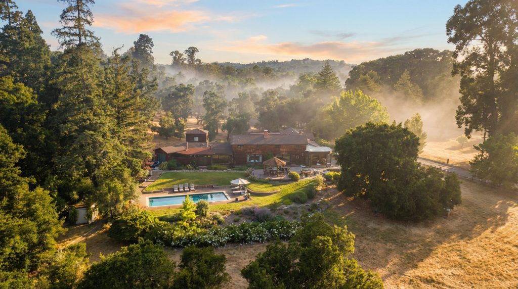 An aerial photo of the Wurster House and its pool, one of the seven residences on The Mortimer Fleishhacker Estate.