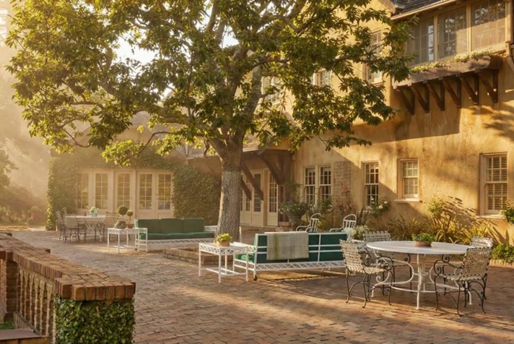 The brick patio of the main house at The Mortimer Fleishhacker Estate, an inviting space for outdoor living and entertaining.