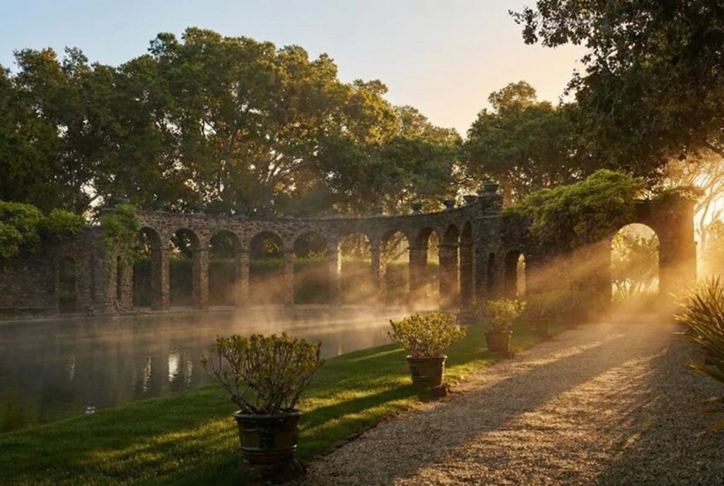Looking towards the open, freestanding arcade of the Roman pool at The Mortimer Fleishhacker Estate, a stunning vista.