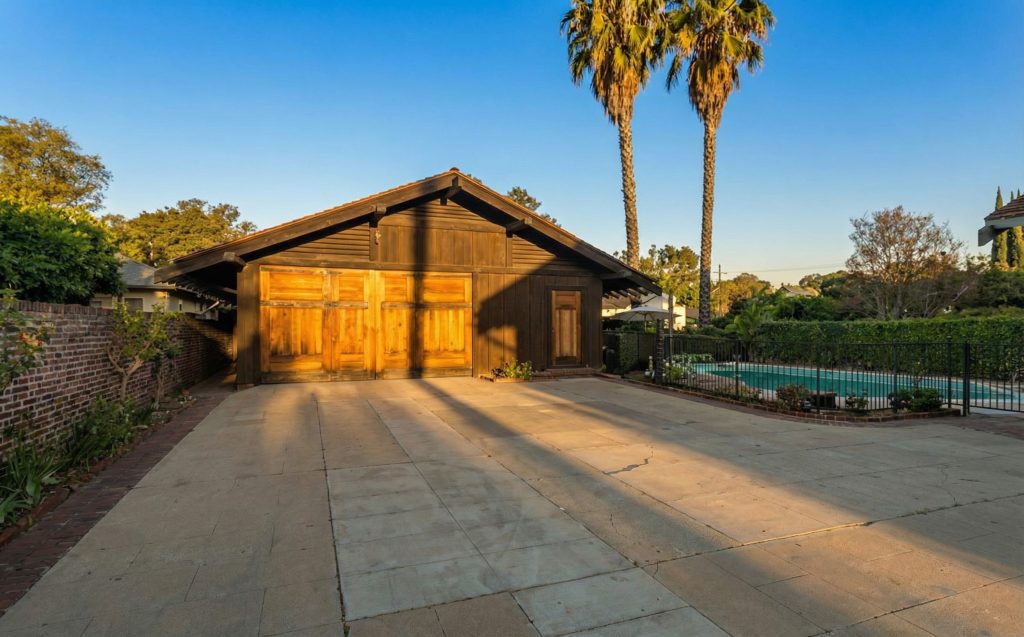 The spacious six-car garage of The Dr. S. S. Crow House, designed to seamlessly integrate with the main residence's architectural style.