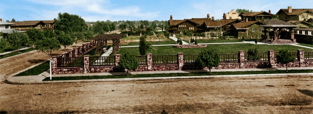 Leroy Hulbert's 1915 image of the enclosing walls and manicured grounds of The Dr. S. S. Crow House, defining the private estate's boundary.