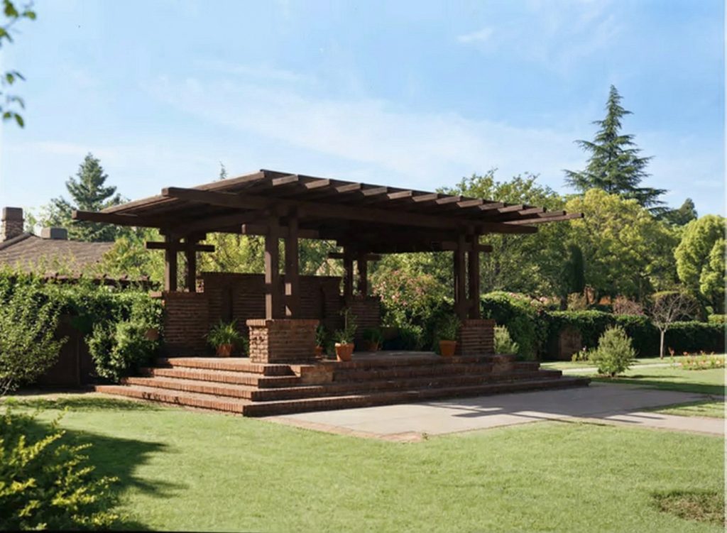 Photograph by Maynard Parker of the elegant garden pergola at The Dr. S. S. Crow House, a key feature of the 1912 landscape additions by Henry Greene.