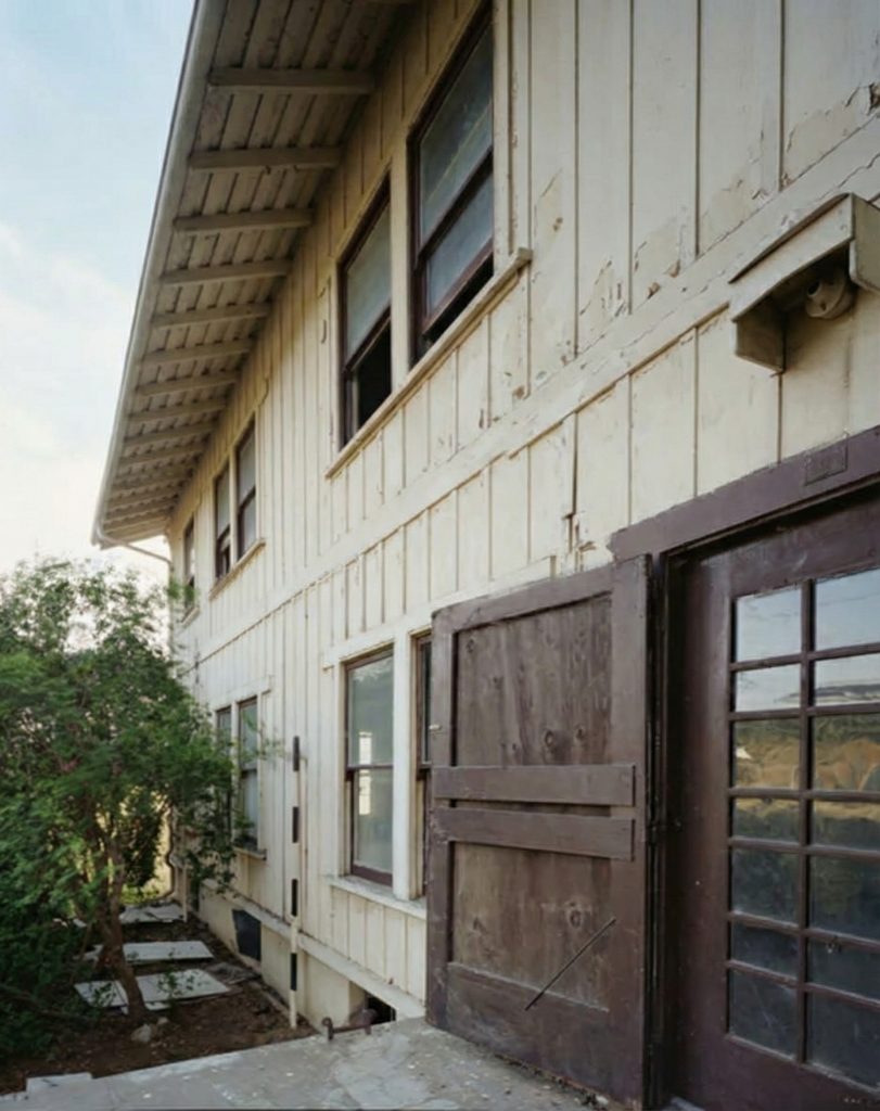 Exterior view of the south delivery doors of The Sespe Ranch Bunkhouse used for kitchen and service access on the ground floor