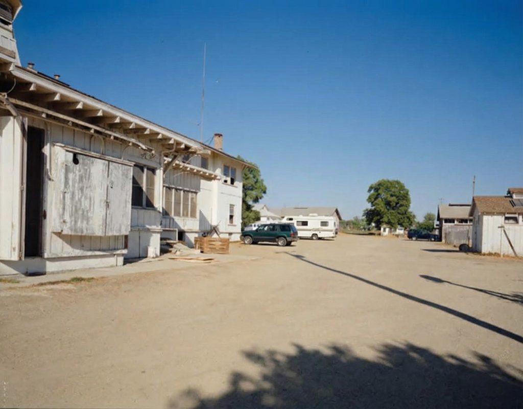 Exterior south perspective view of The Sespe Ranch Bunkhouse revealing the full length of the two-story utilitarian structure