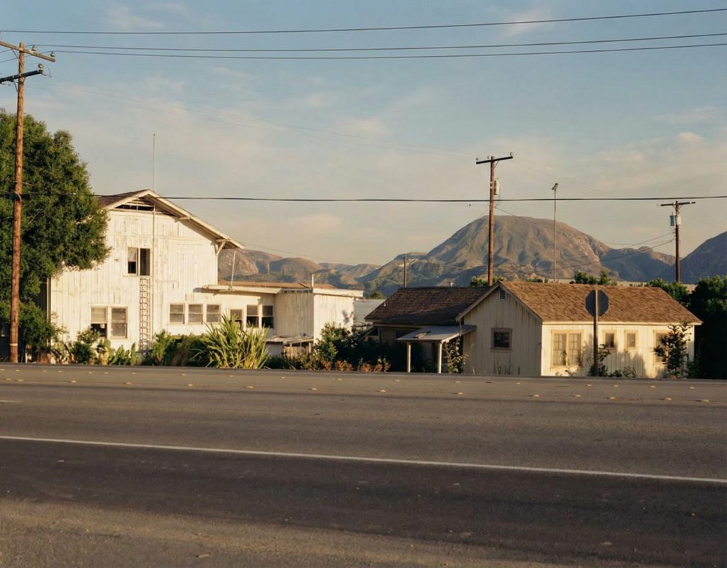 Distant exterior perspective of the west elevation of The Sespe Ranch Bunkhouse situated within the Rancho Sespe grounds