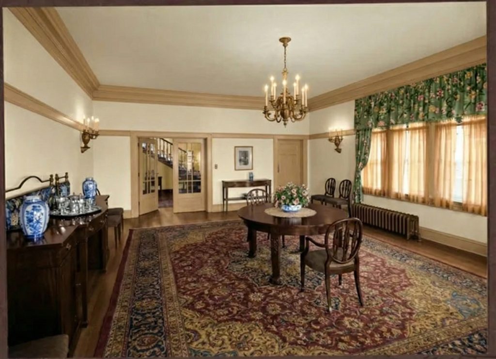 The formal dining room of The Mortimer Fleishhacker Estate in 1915, with its understated elegance and large windows.