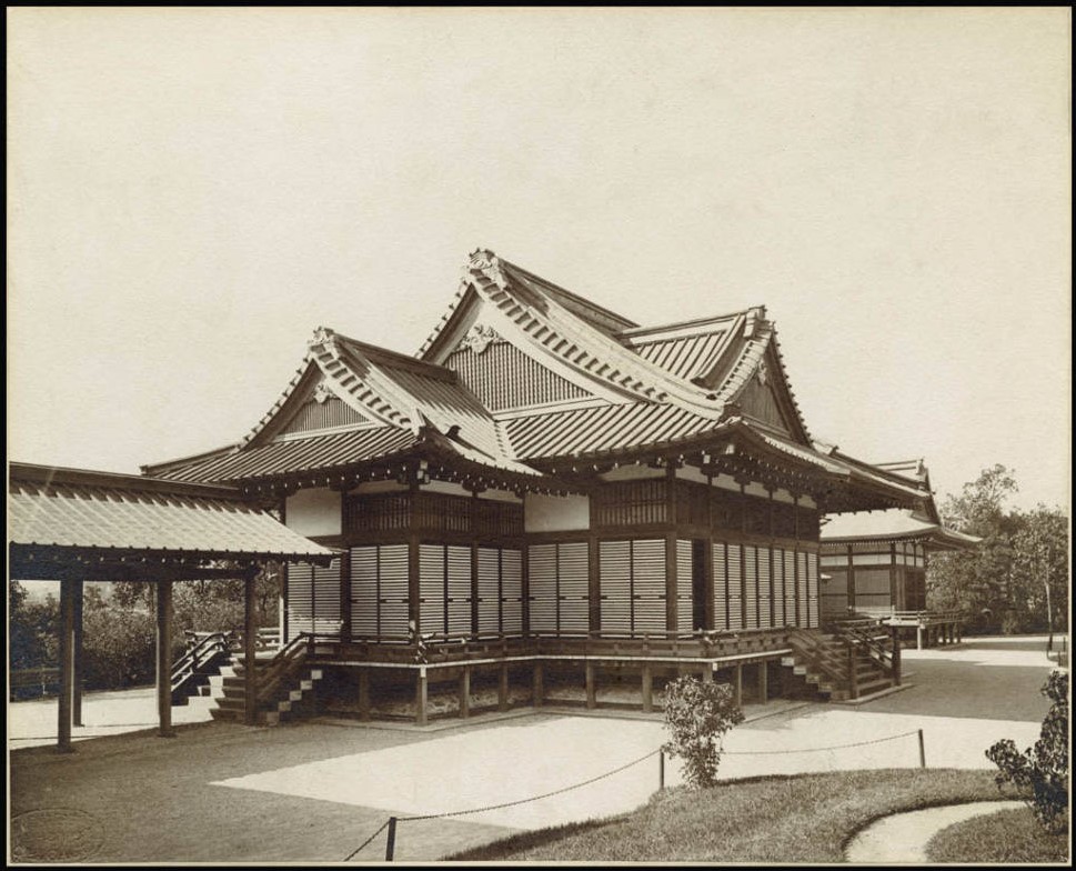 Historic sepia photograph of the Ho-o-den pavilion, a half-scale reproduction of a Heian-period Japanese palace, built for the 1893 World's Columbian Exposition in Chicago, showing the complex stepped rooflines, exposed timber structure, and raised platform of traditional Japanese temple architecture
