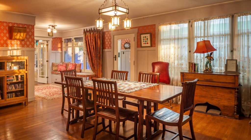 Dining room with Mission-style table, Arts and Crafts chandelier, and built-in sideboard at the Garfield House